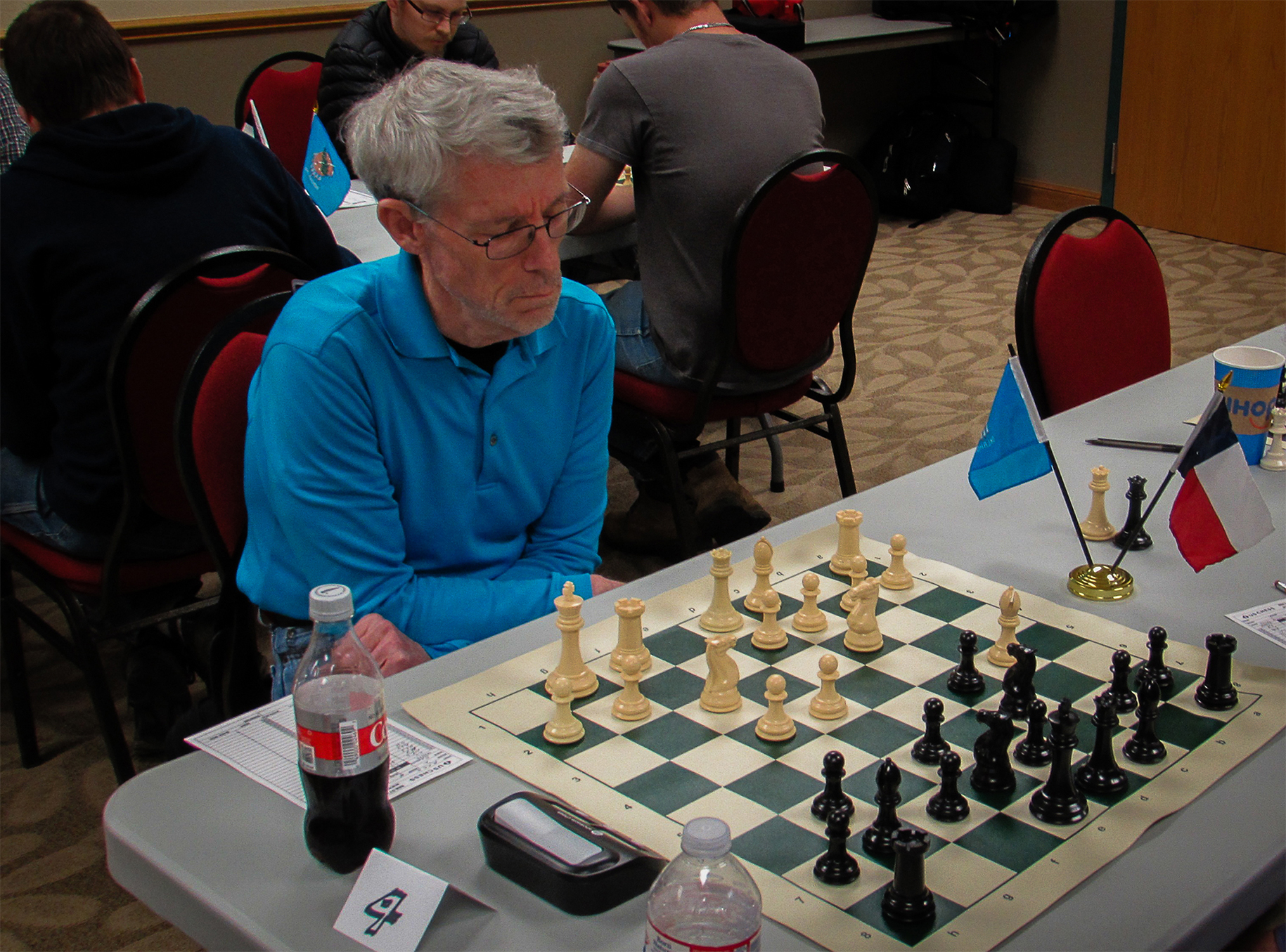 Rookie Harold Brown played a close match on Board 4.  He is a Club Tournament Director, US Chess Life Member and hails from Tulsa.  He is ranked in the 94th Percentile for all USA chess players and in the 87th Percentile for USA Seniors.  He is ranked Number 23 in Oklahoma.  Photo by Mike Tubbs.
